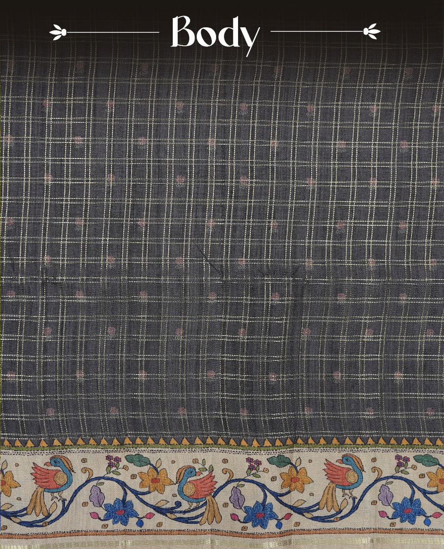 Gray colour semi tusser silk saree featuring gold zari check pattern with floral butti motifs, with contrast floral kodi & bird pattern and paired with matching blouse.