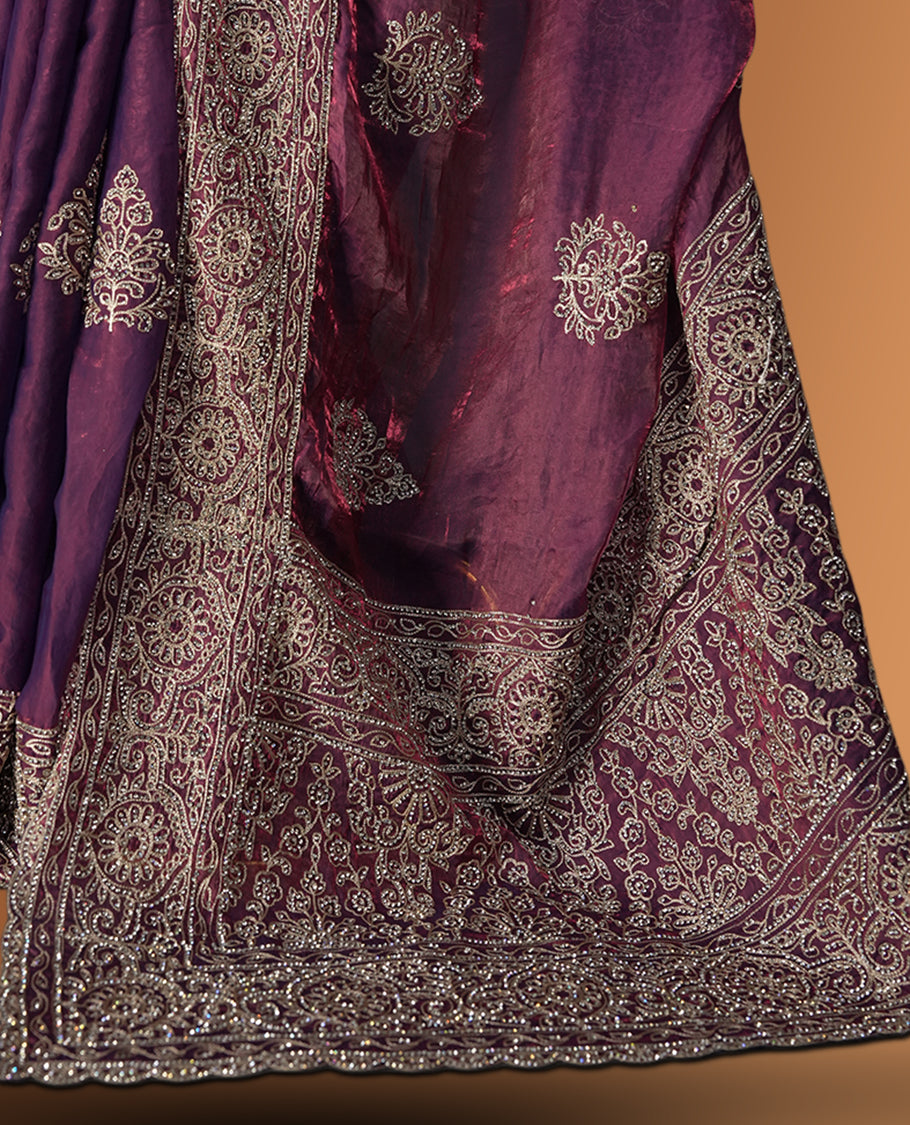 Onion pink colour velvet chiffon designer saree in elegant two tone shades, featuring light gold zari, kodi work with handwoven style thread aari & dori embroidery work, Swarovski stone work and all over motifs, comes with matching blouse.