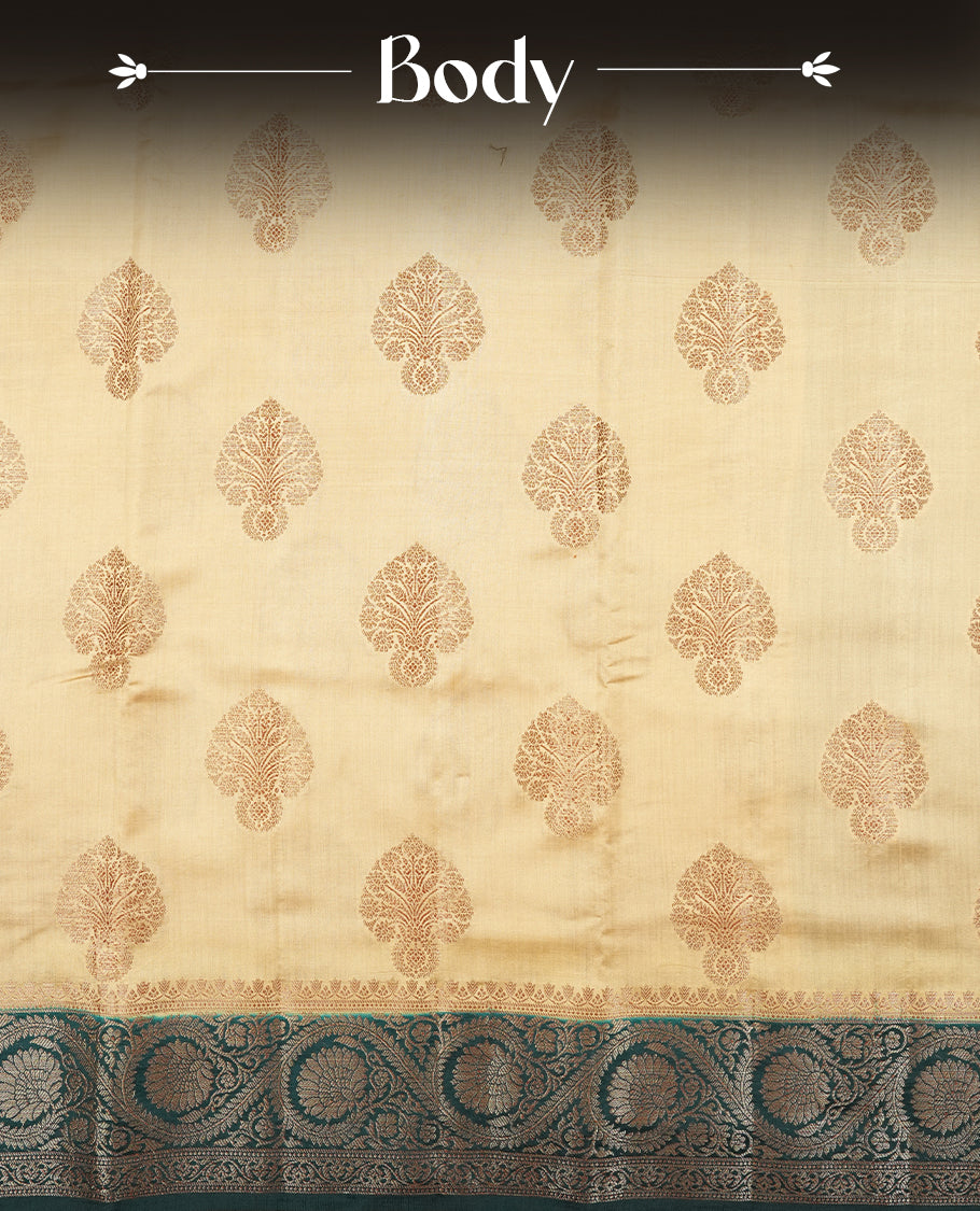 Gold Cream Banaras soft silk saree with gold zari oval motifs on body, with contrast Teal colour floral pattern on pallu, border, and Matching blouse.