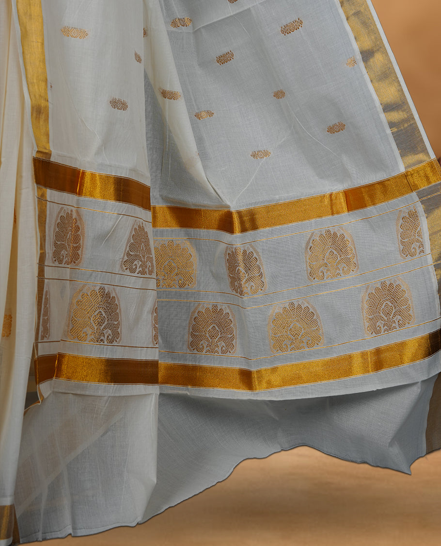 Off white colour cotton Kerala saree featuring a Plain body, an intricately woven traditional border with patterns on pallu, paired with a matching blouse.