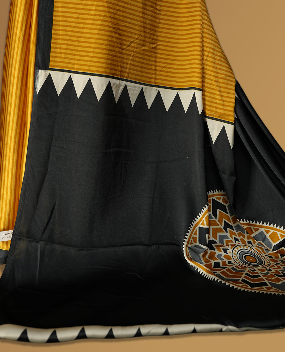 Mustard yellow colour striped saree with a bold black border and geometric pallu featuring a Madhubani style motif and paired with blouse.