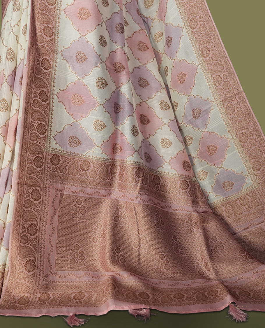 Pastel cream colour semi Banarasi Tussar Georgette saree with blush pink and lilac zari floral motifs, ornate dusty rose border and rich pallu & Includes a matching unstitched blouse piece to complete the look.