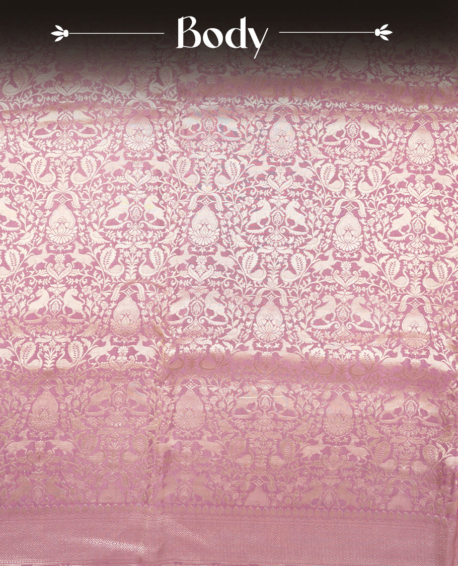 Lavender colour Mysore Crepe Silk saree fearturing gold zari kodi visiri & Animal brocade pattern on body and self colour border paired with matching blouse