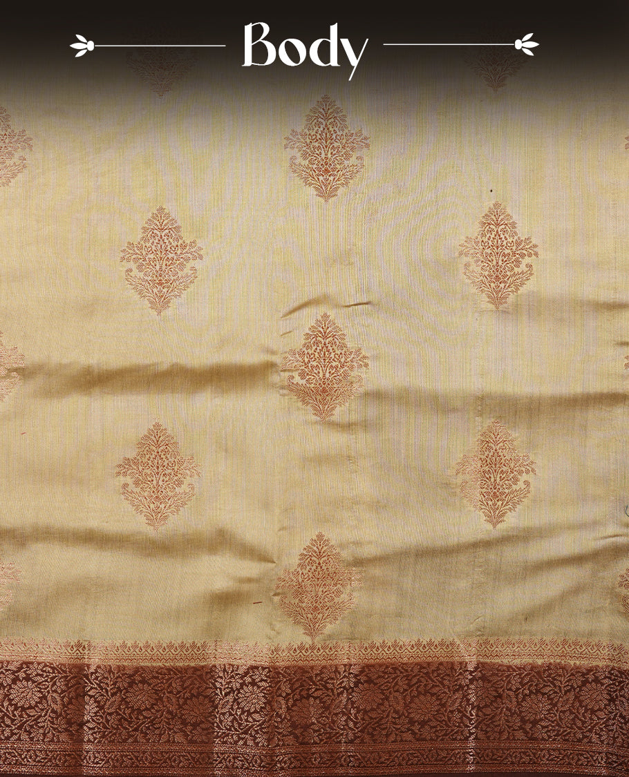 Cream beige Banaras soft silk saree with gold zari motifs on body, with contrast Chocolate brown colour floral pattern on pallu, border, and Matching blouse.