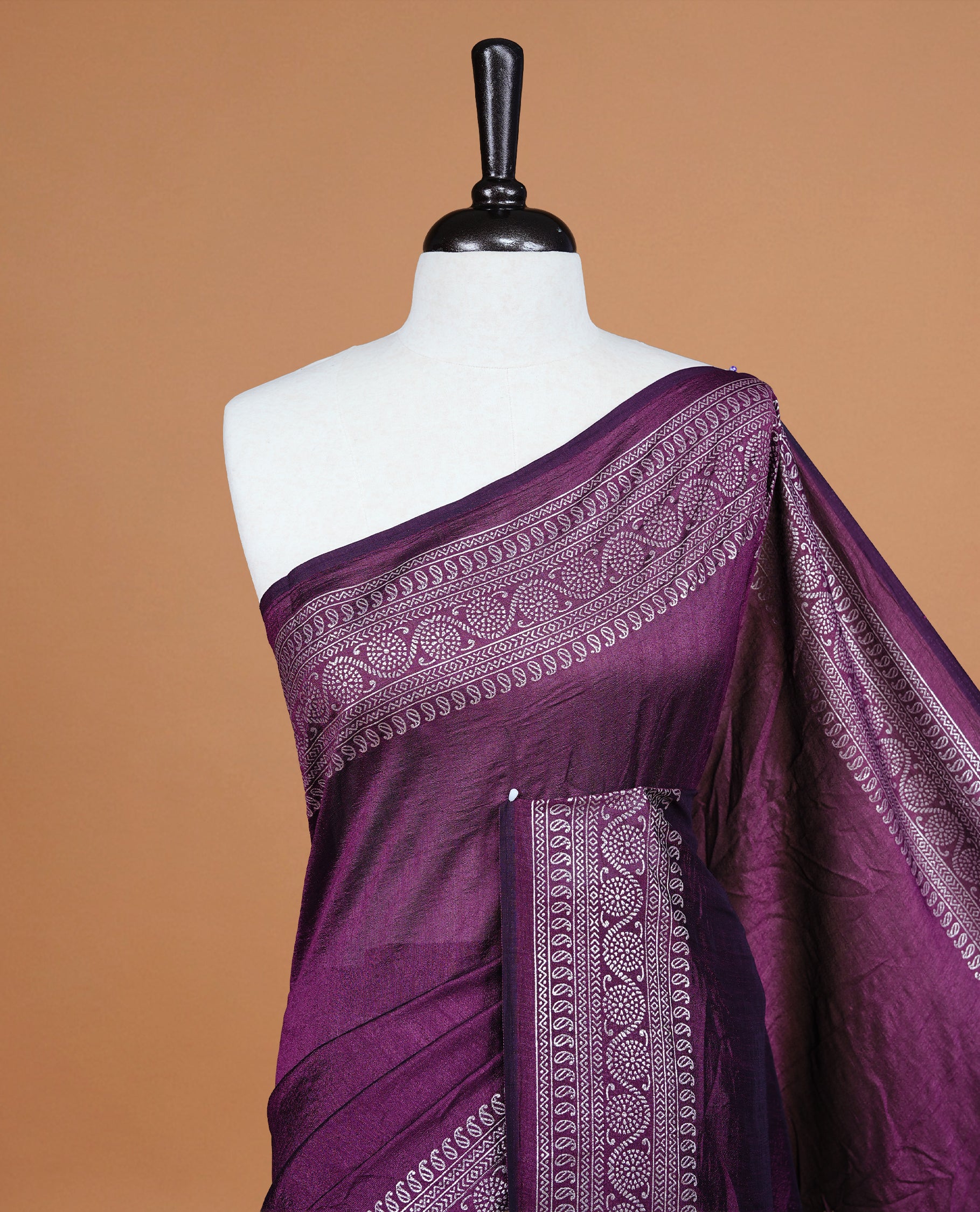 Purple colour semi silk saree featuring Elegant plain body with fancy border, comes with matching self colour blouse piece.