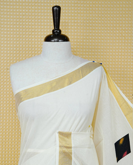 Cream Colour Kerala Saree Featuring Black Colour  Geometric Motifs And A Classic Gold Zari Border, Paired With A Matching Blouse Piece.