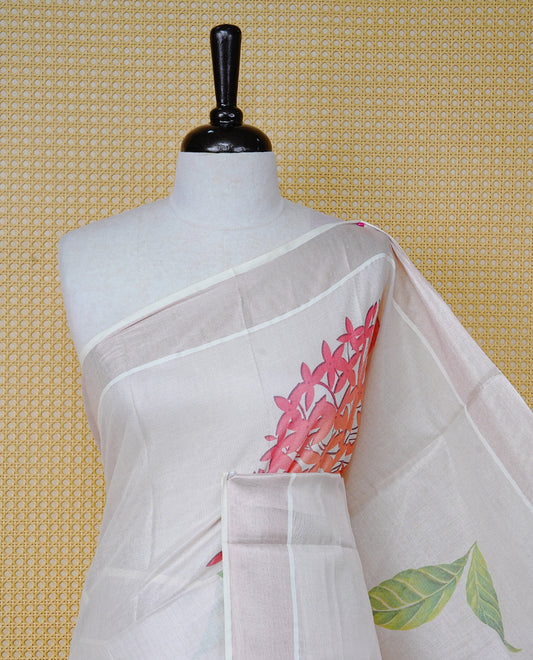 Cream Colour Tissue Kerala  Saree Featuring A Digital Floral Printed Body &  Pallu, , Beautifully Enhanced With A Classic  Rose Gold Zari Border And Red &  Green  Tassels, Paired With A Matching Blouse Piece.