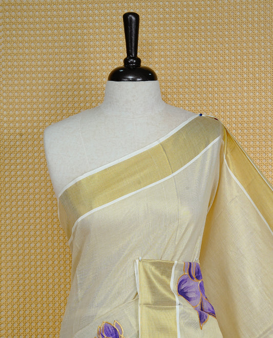 Cream colour Tissue kerala saree featuring Embroidery buttas on body, complemented by Floral thread work with Print & kasavu kara, comes with matching blouse piece.