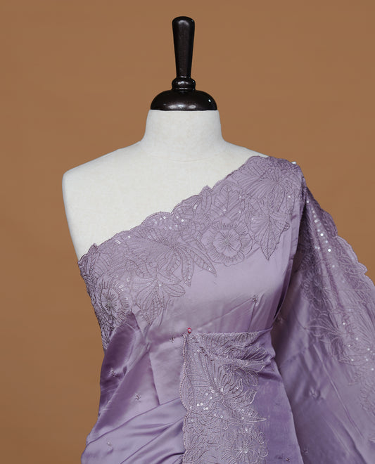 Pastel Lavender colour Designer saree featuring Elegant Thread & sequins body, complemented self colour thread & Sequins scalp border, paired with matching blouse piece.