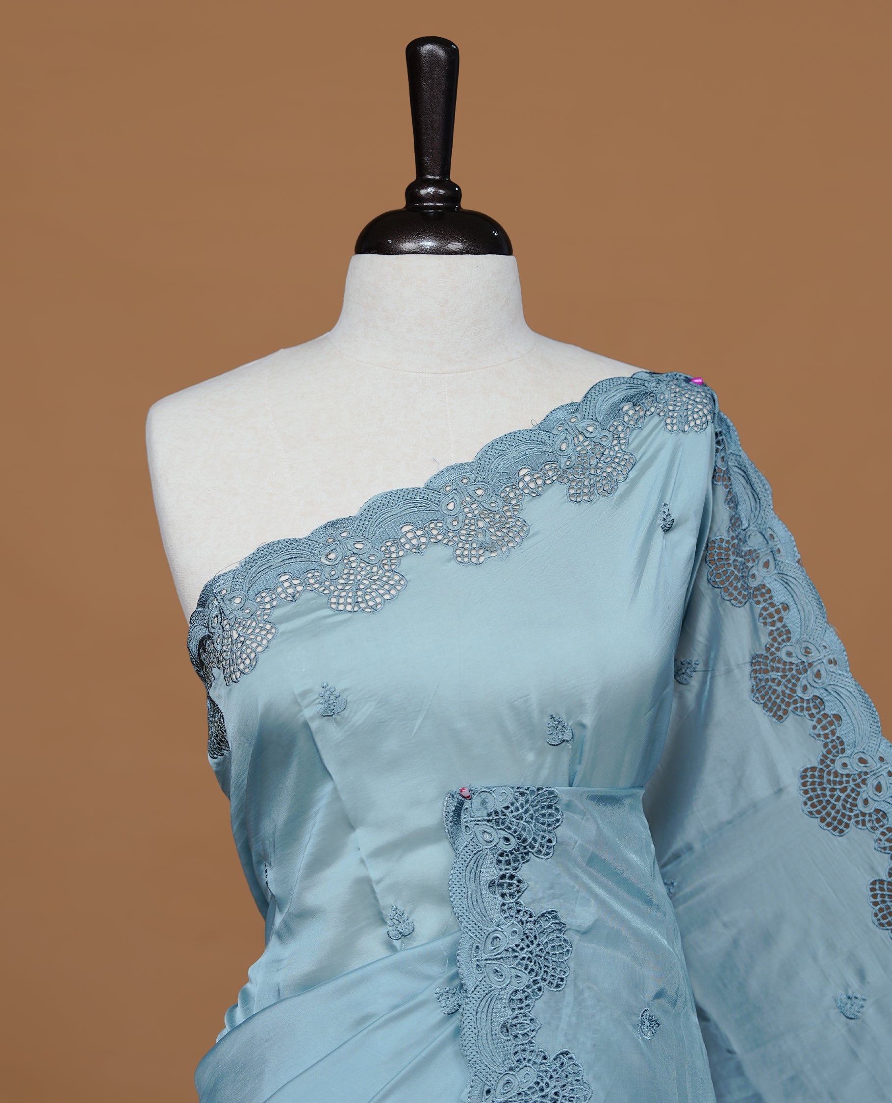 Pastel Teal colour Designer saree featuring Classic Plain body Styled with Thread motifs, Enrich with Thread & scalp border, paired with matching blouse piece.