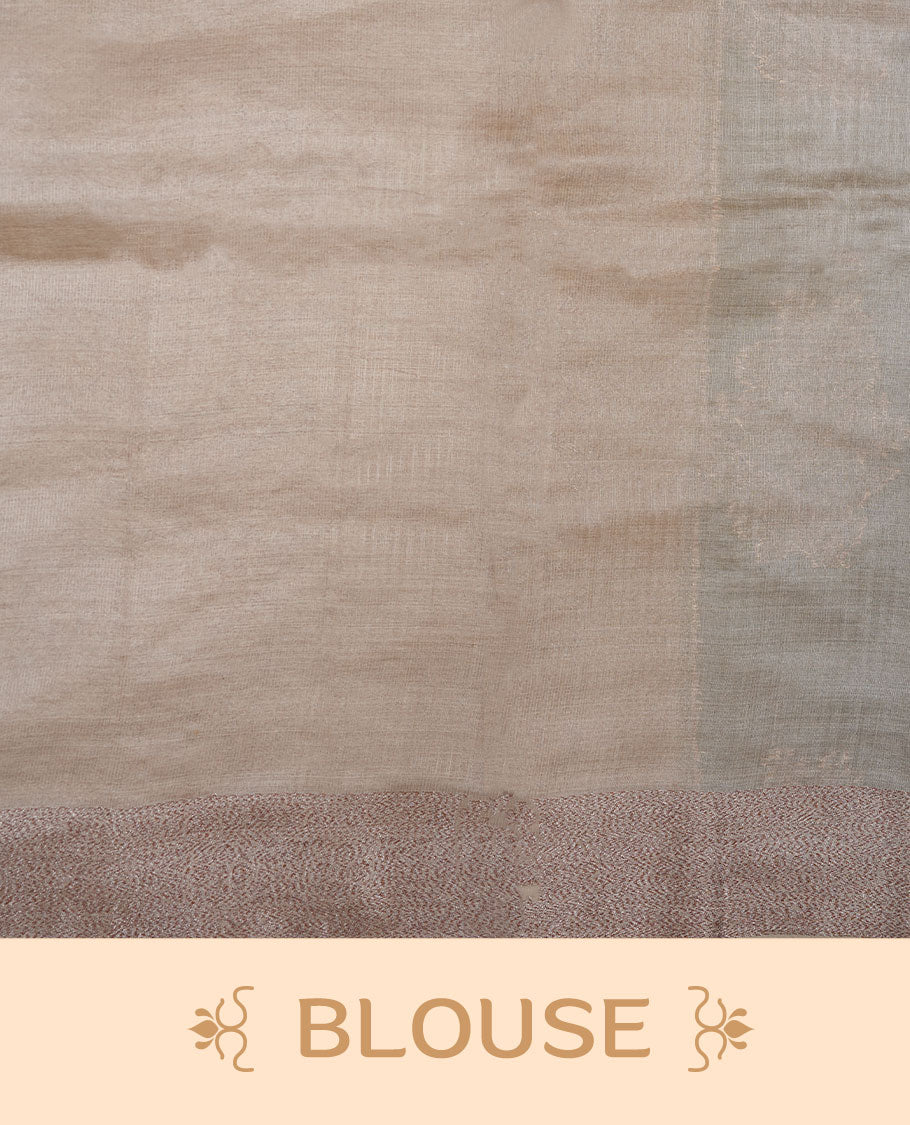 Olive green colour pure banaras tusser silk saree highlighting antique zari pattern across body, with contrast cream colour with zari border and paired with matching blouse