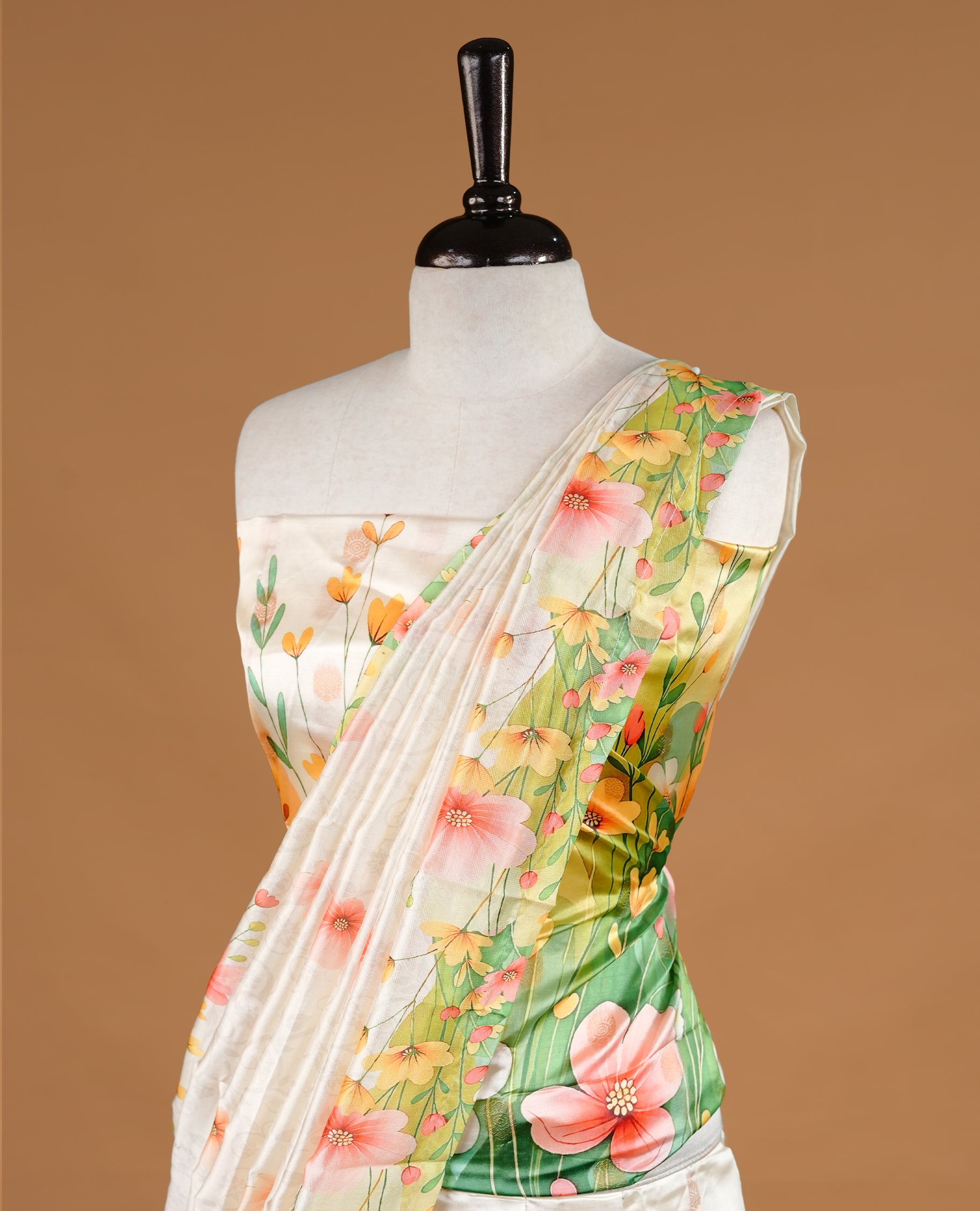 Off white colour semi stitched half saree featuring elegant multicolour floral prints, paired with a vibrant floral border and matching printed dupatta ,paired with matching blouse piece.