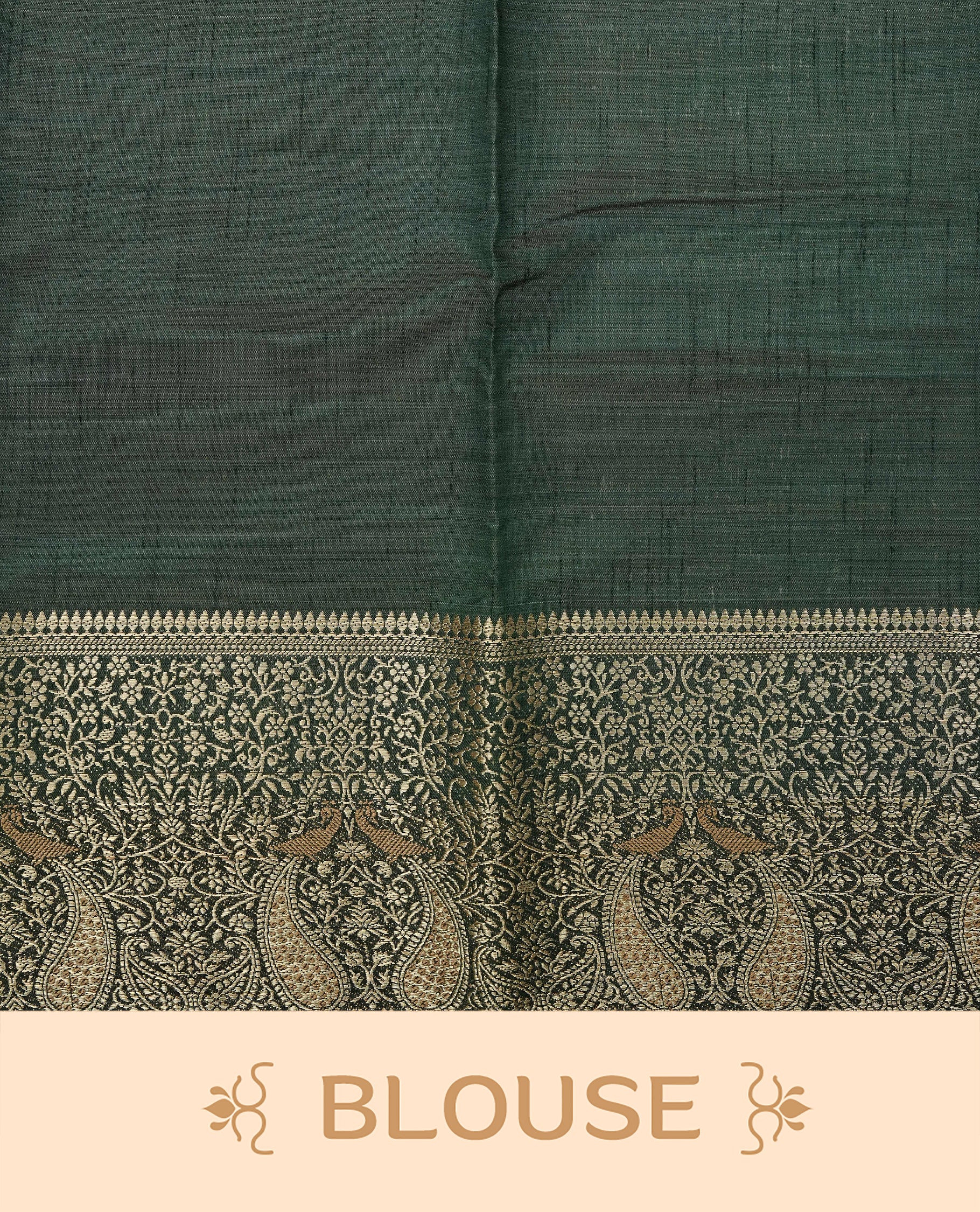 Light gold tussar saree featuring Elegant plain body, complemented by contrast Bottle green colour with Gold zari Floral kodi with Peacock Pattern border, comes with matching blouse piece.