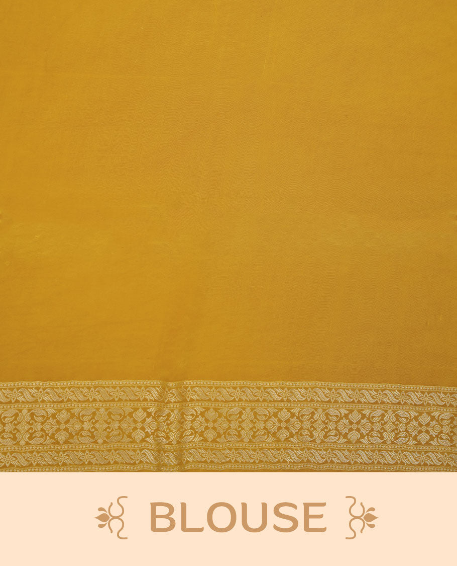 Yellow colour banaras satin crepe saree featuring gold zari pattern across body, with self colour border with gold zari pattern and paired with matching blouse.