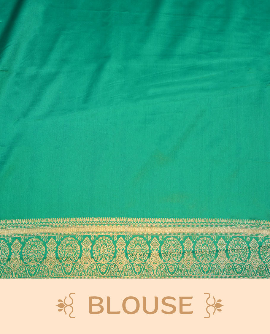 Green colour Banaras Satin Crepe saree featuring gold zari floral motifs on the body, a richly woven traditional border with intricate gold zari detailing, and paired with a matching blouse.