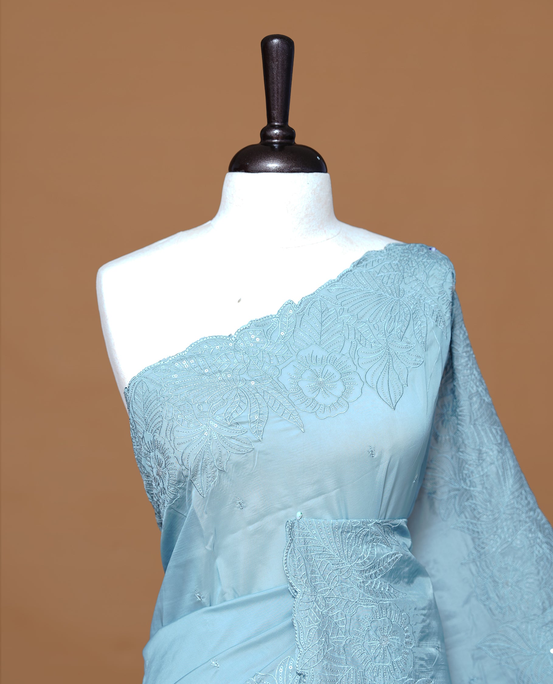 Pastel Blue colour Designer saree featuring Elegant Thread & Sequins body, complemented self colour thread & Sequins scalp border, paired with matching blouse piece.