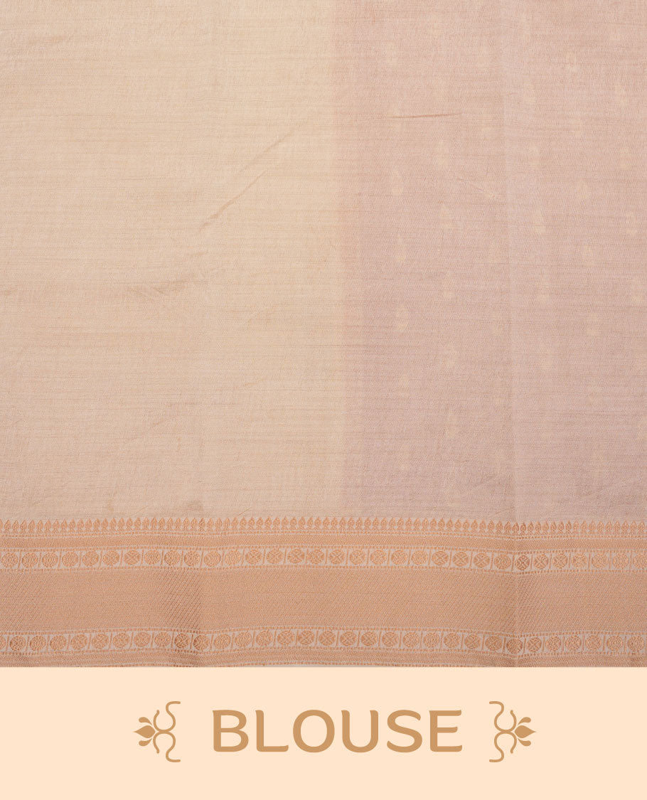 Orange colour tussar saree featuring litte gold zari motifs on body, contrast cream colour border and pallu with zari woven design, comes with matching blouse piece.
