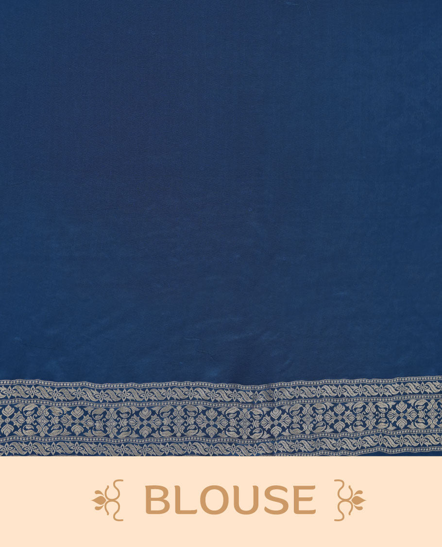 Dark blue colour banaras satin crepe saree featuring gold zari pattern across body, with self colour border with gold zari pattern and paired with matching blouse.