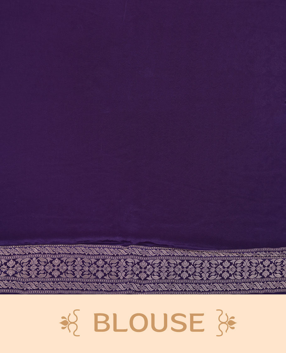Deep purple colour banaras satin crepe saree featuring gold zari pattern across body, with self colour border with gold zari pattern and paired with matching blouse.