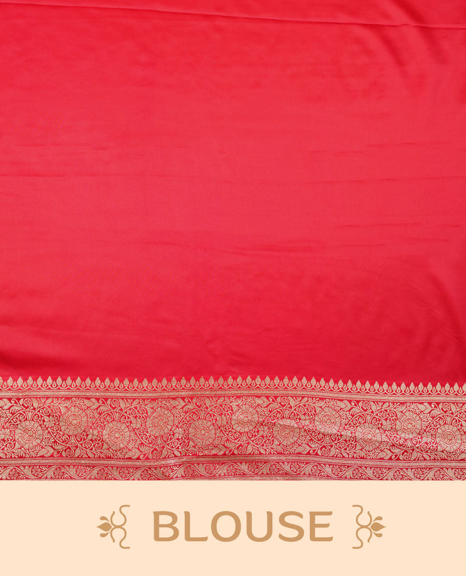 Bright red colour Banaras Satin Crepe saree featuring gold zari floral motifs on the body, a richly woven traditional border with intricate gold zari detailing, and paired with a matching blouse.