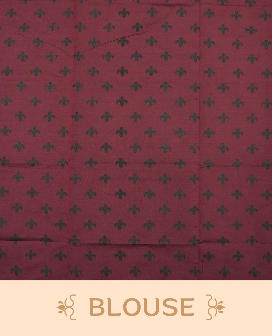 Dark Maroon colour poly cotton saree with black vertical dotted line pattern on the body, paired with a matching pallu featuring black zigzag geometric border, and a coordinated all‑over black stylised fleur‑de‑lis printed blouse piece.