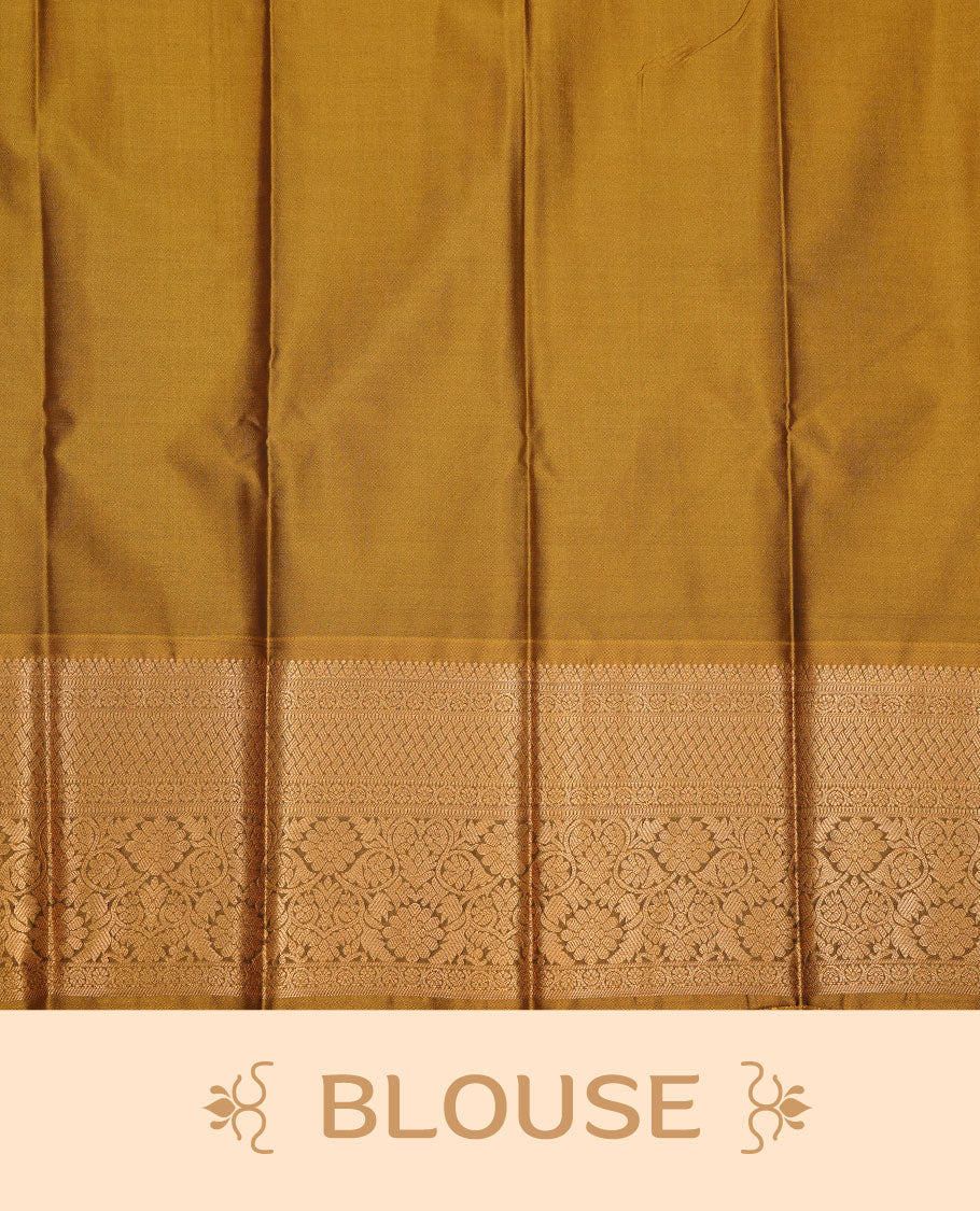 Olive colour soft silk saree featuring gold zari motifs on body, complemented by self colour with zari border, paired with matching blouse piece.