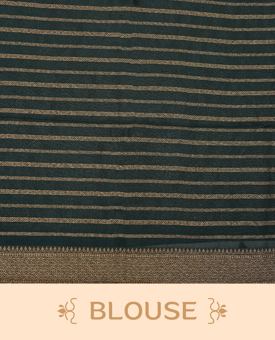 Dark green colour semi banaras tussar georgette featuring gold zari leaf pattern across body, finished with gold zari border and paired with matching blouse.