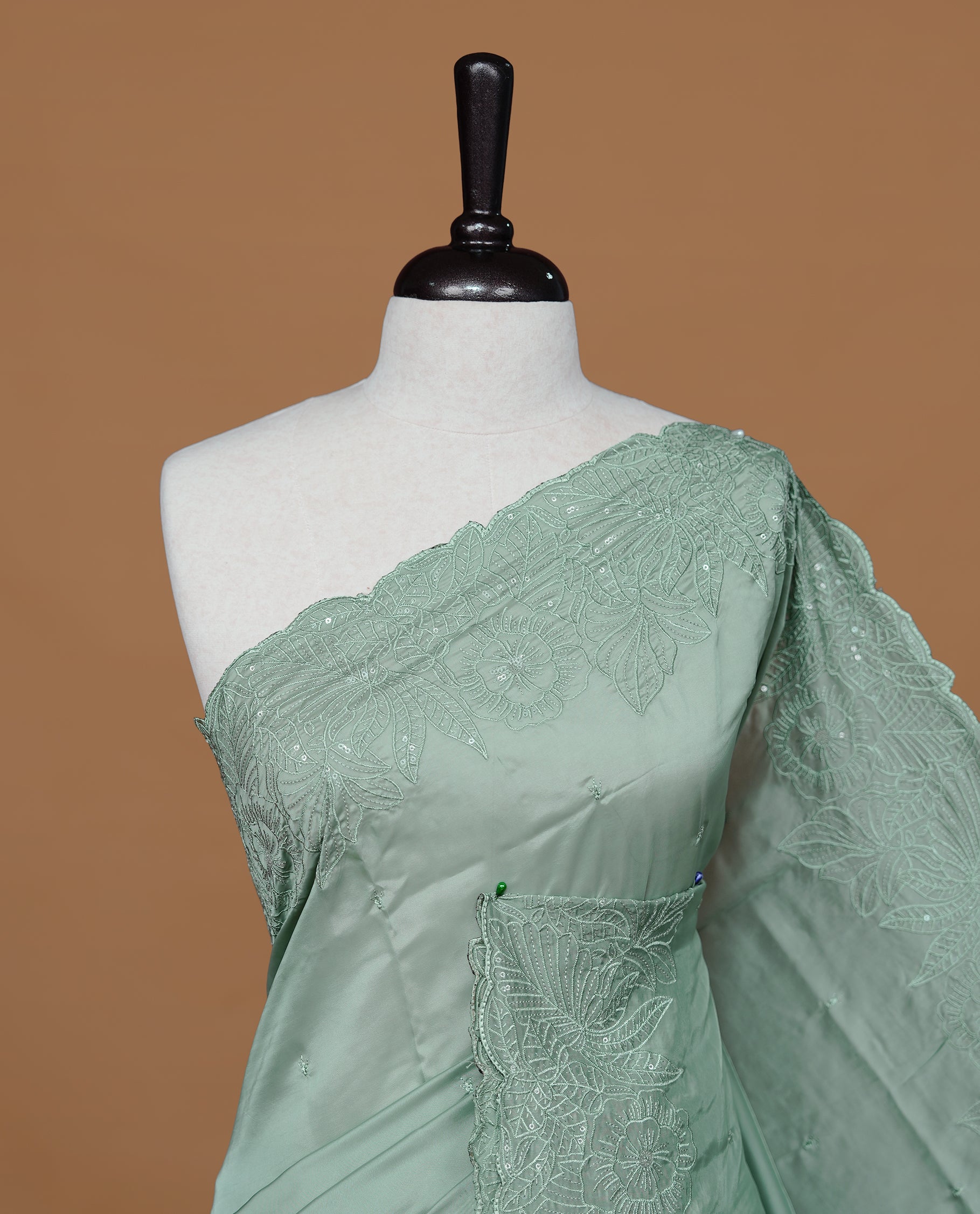 Pastel Green colour Designer saree featuring Elegant Thread & sequins  body, complemented self colour thread & Sequins scalp border, paired with matching blouse piece.
