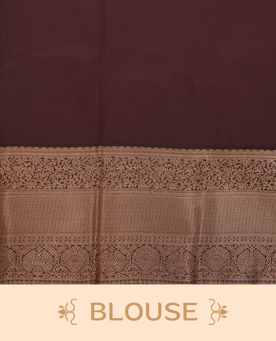 Rust orange colour semi silk saree featuring gold zari dotted stripes and stripes on body highlighting contrast dark chocolate gold zari  floral kodi border , paired with matching blouse