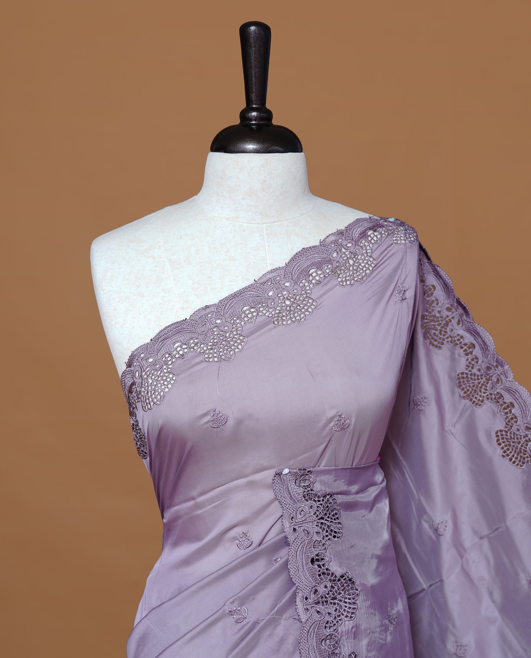 Pastel lavender colour Designer saree featuring Classic Plain body Styled with Thread motifs, Enrich with Thread & scalp border, paired with matching blouse piece.