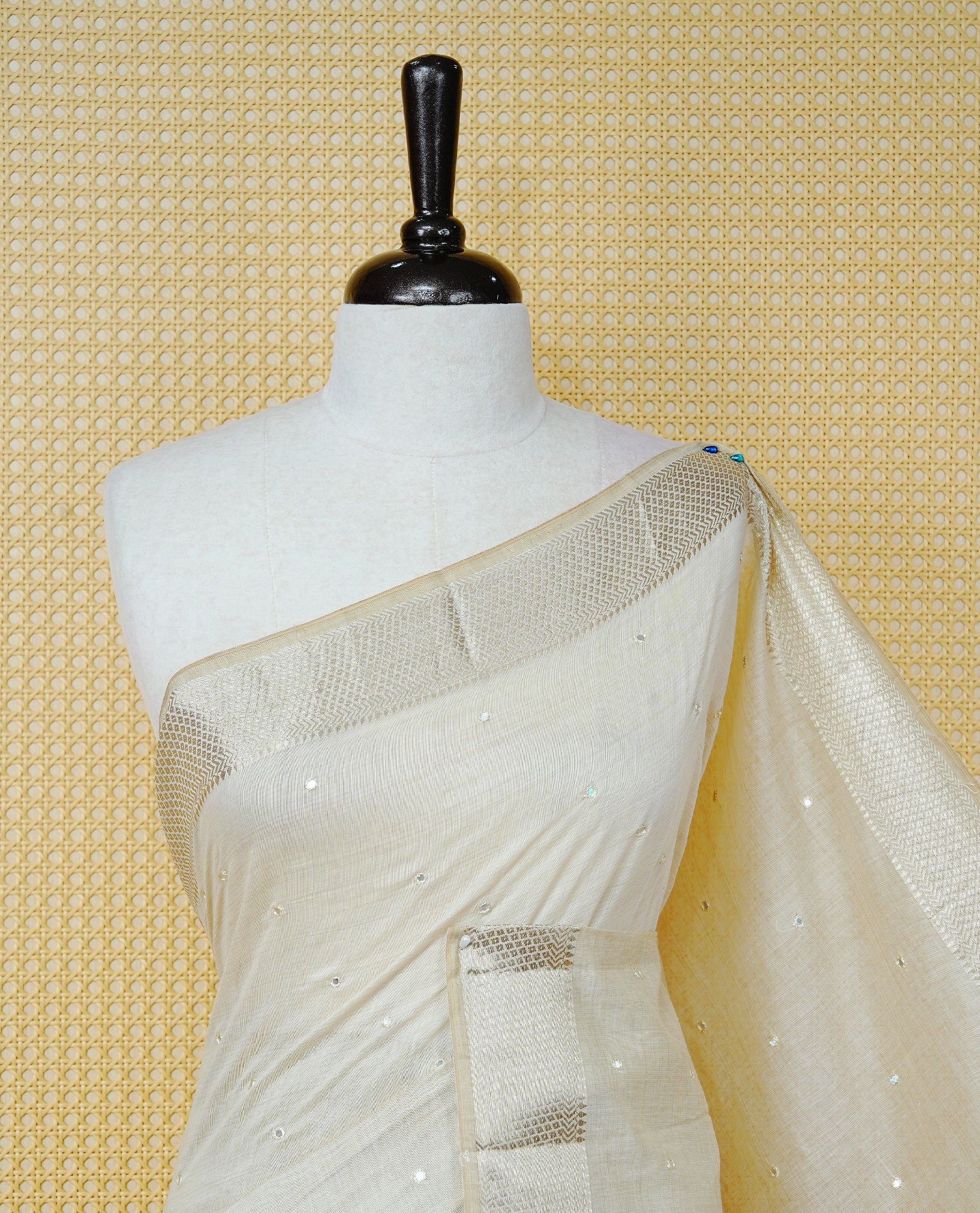 Cream Colour Tussar Kerala Saree Featuring Elegant Mirror Work on the Body, Enhanced with a Light Gold Zari Border, Floral Thread Work, and a Pink & Gold Zari Pallu, Paired with a Matching Blouse Piece