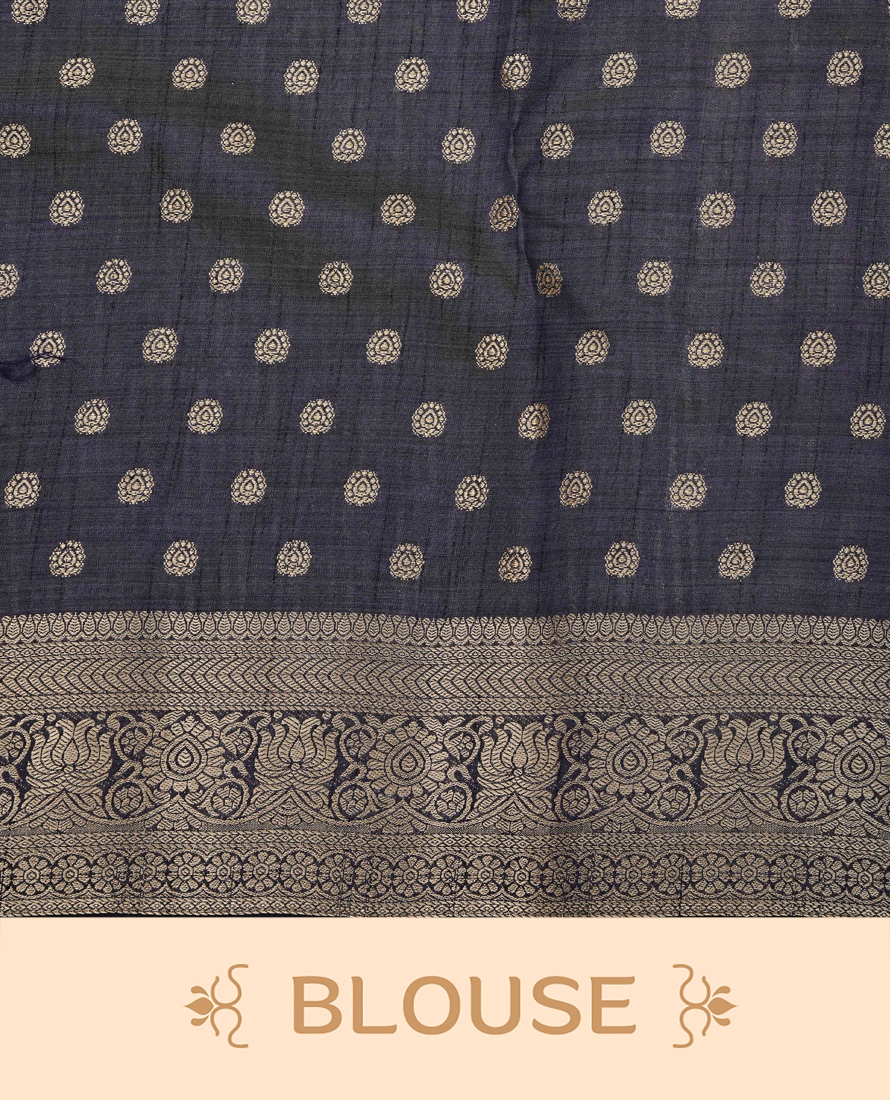 Light Gold Tussar saree featuring Gold zari buttas on body, complemented by contrast Navy Blue Colour with Gold zari border, comes with matching blouse piece.
