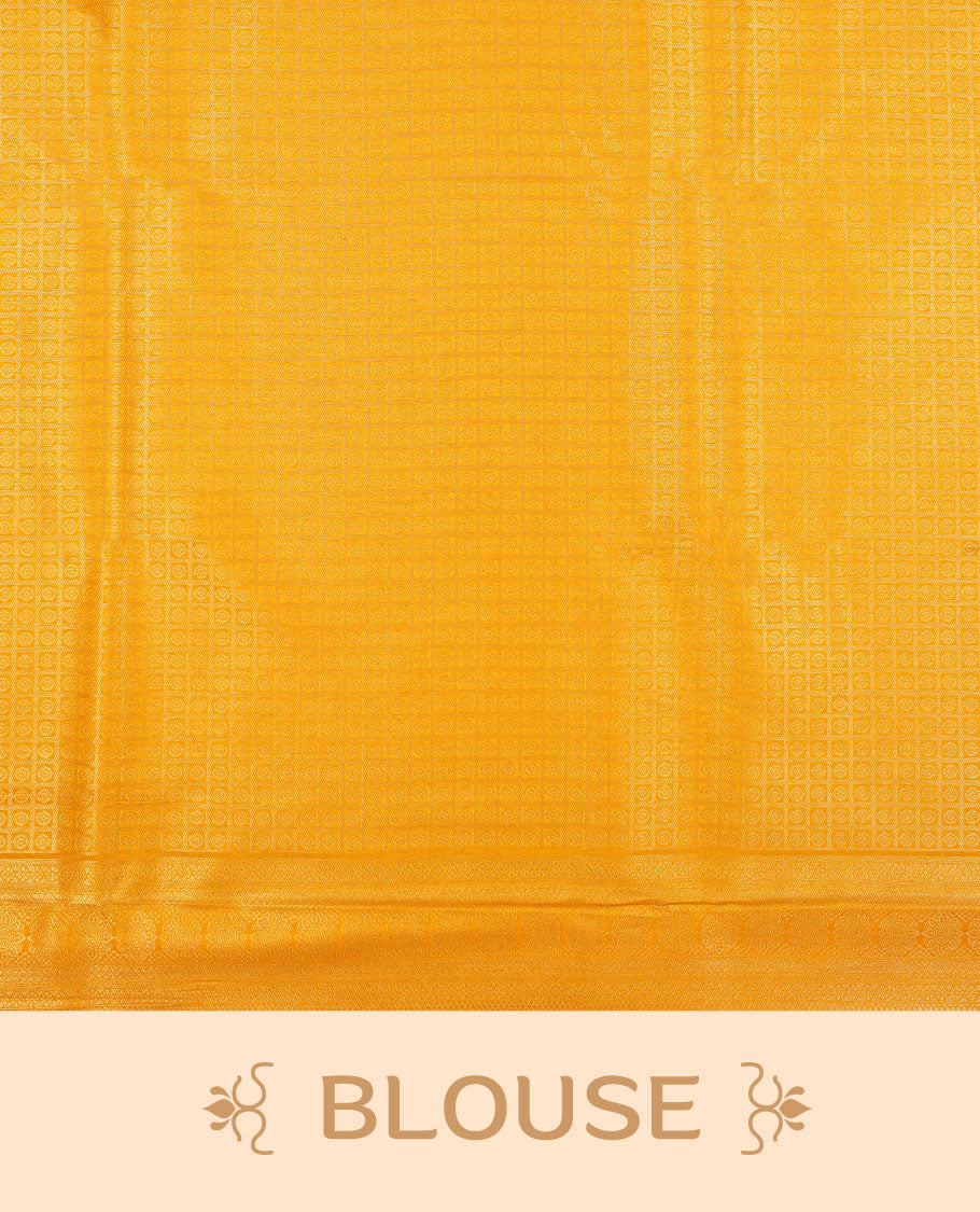 Light mustard colour semi silk brocade saree featuring intricate Gold patterns across the body, complemented by a Self colour woven border and pallu, paired with a matching blouse.