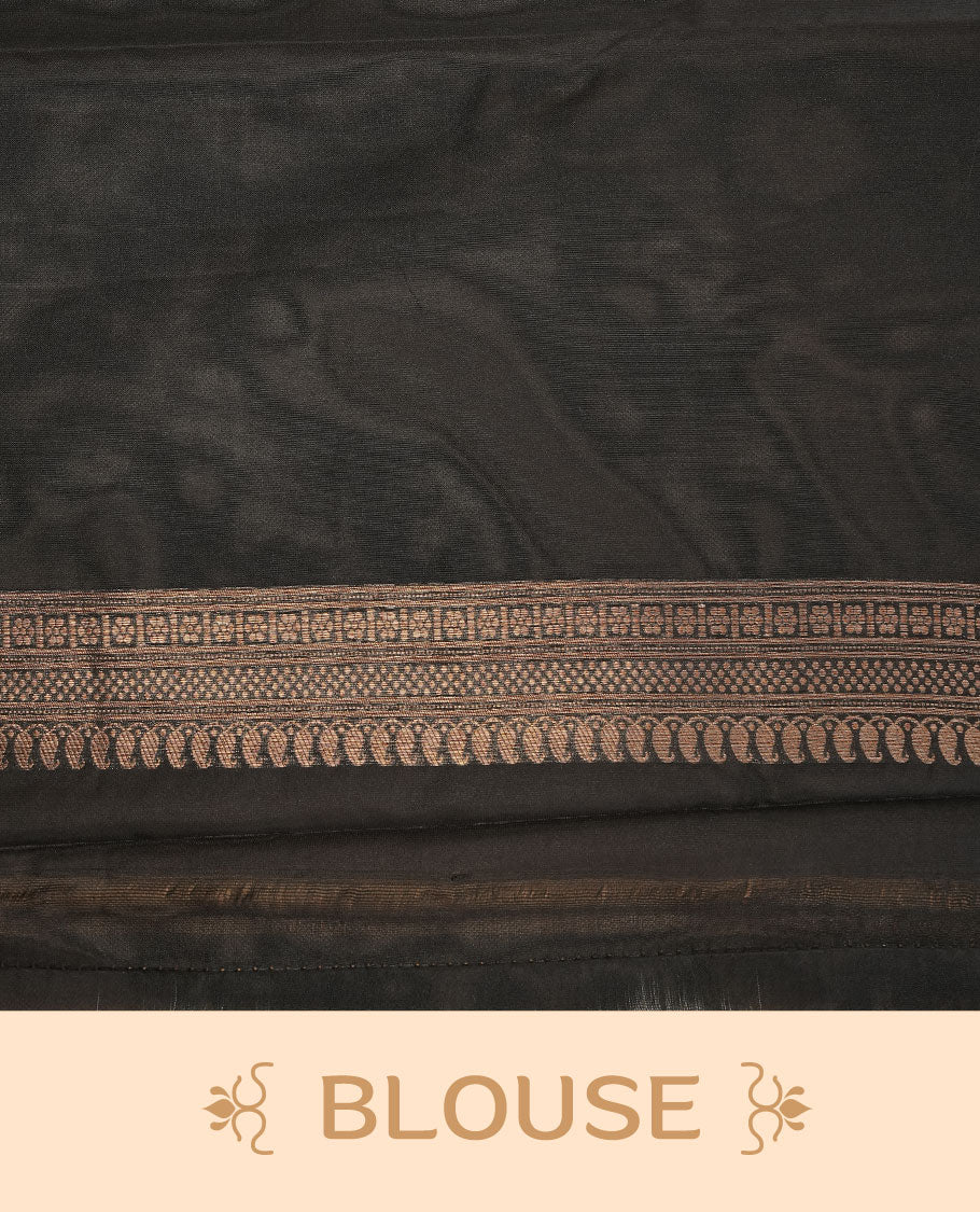 Black colour semi banaras katan saree featuring Gold zari Pattern across body, complemented by self colour with zari border, paired with matching blouse piece.