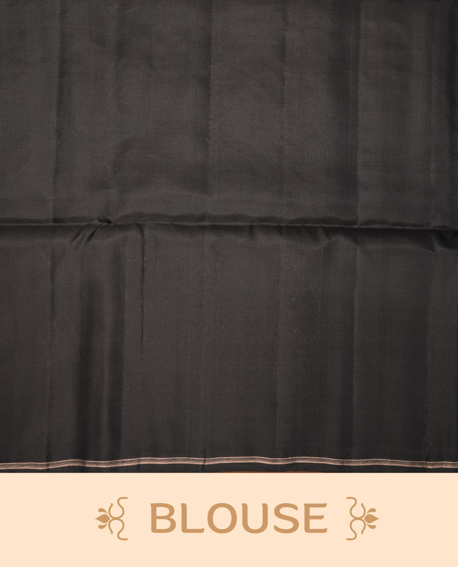 Black colour soft silk saree featuring gold zari peacock motifs on body, complemented by self colour with gold zari border, peacock print on pallu, paired with matching blouse piece.