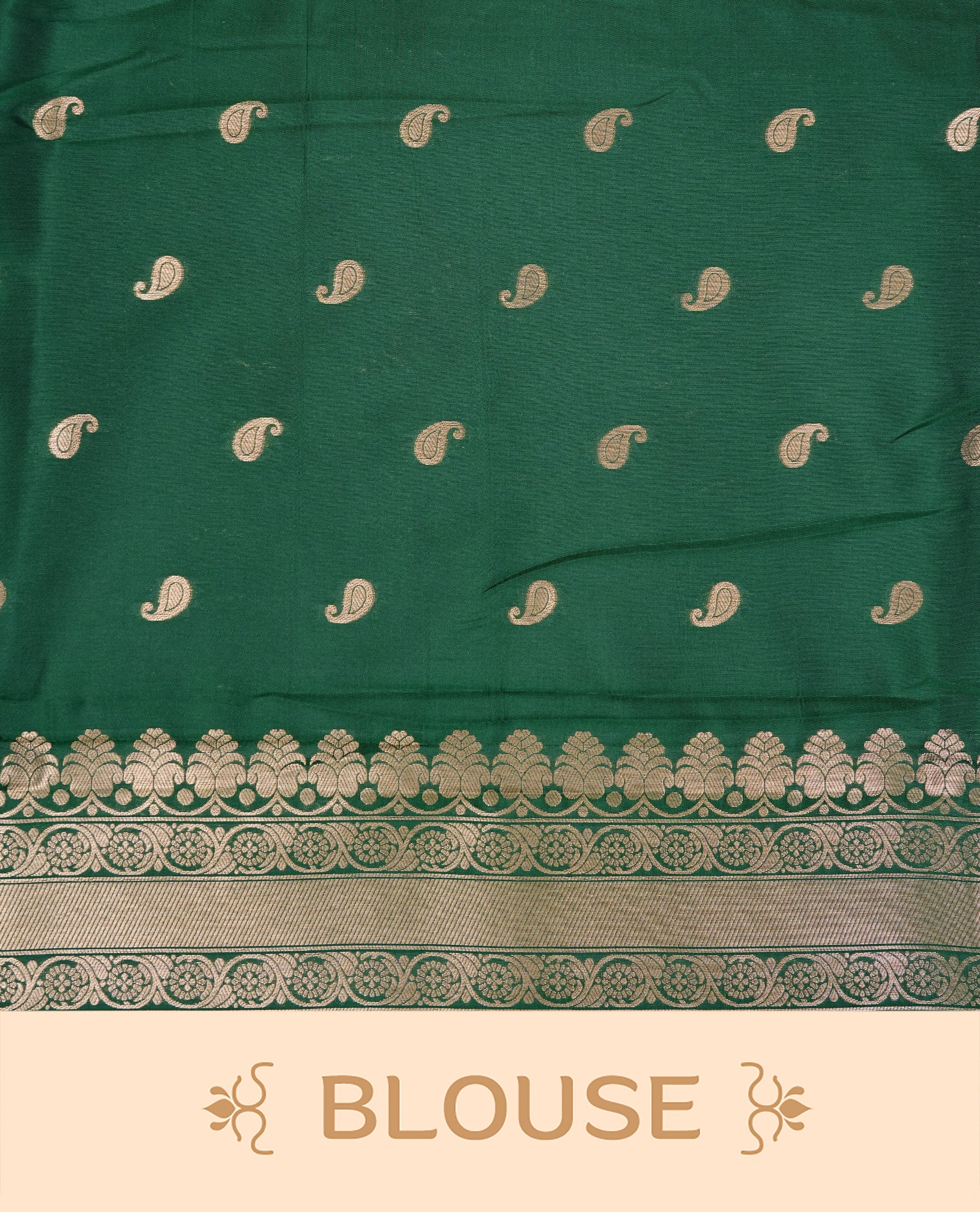 Bottle Green  Colour Softie Silk Saree Featuring An All Over Gold Woven Leaf Pattern, Finished With A Matching Border Adorned With Intricate Paisley And Floral Motifs, Paired With A Matching Blouse Piece.