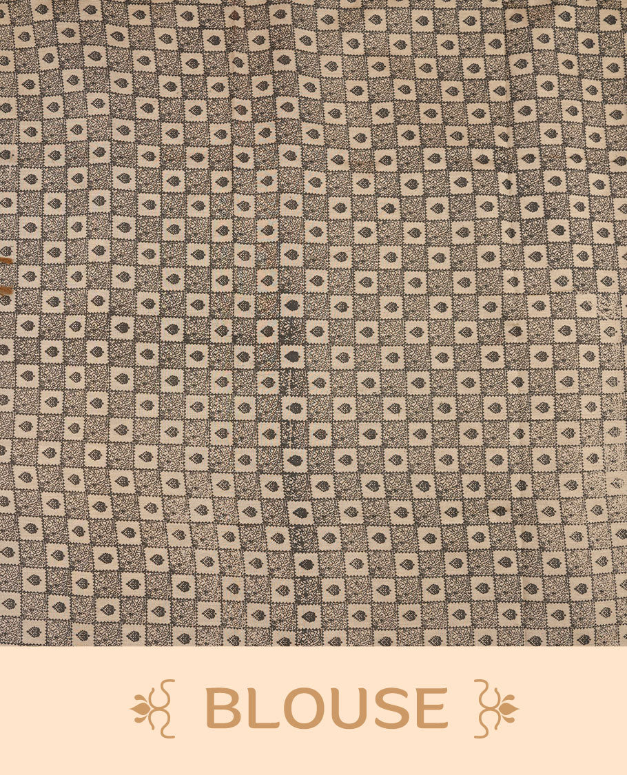 Dark Beige colour poly cotton saree with black vertical dotted line pattern on the body, paired with a matching pallu featuring black zigzag geometric border, and a coordinated all‑over black stylised fleur‑de‑lis printed blouse piece.