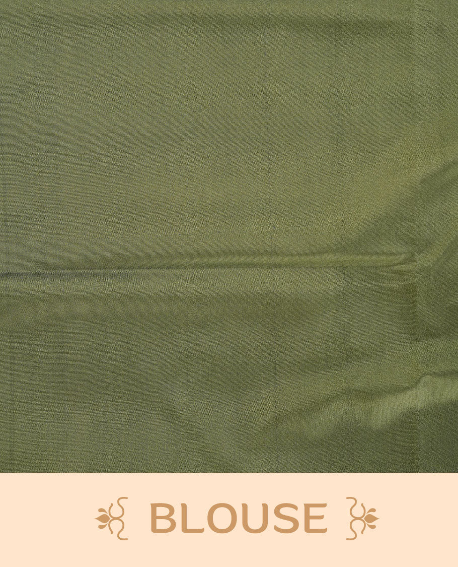 Seafoam green soft silk saree features a sleek borderless design with intricate antique zari motifs, flowing into a seamless self colored pallu and a matching blouse piece.