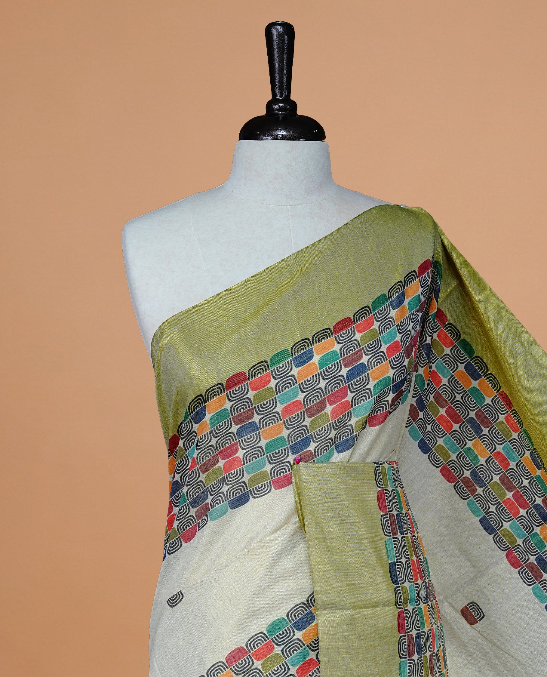 Cream Colour Tissue Kerala Saree Featuring A Classy Multicolour Box Pattern On The Body, Styled With A Green And Gold Zari Border And Pallu, Paired With A Matching Blouse Piece.
