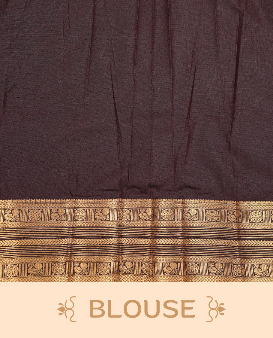 Dark chocolate colour soft silk saree featuring Gold zari motifs on body, complemented by self colour with traditional border, paired with matching blouse piece.