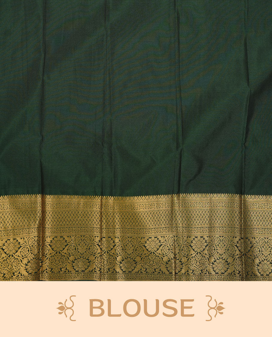 Dark green colour soft silk saree featuring gold zari motifs on body, complemented by self colour with traditional border, paired with matching blouse piece.