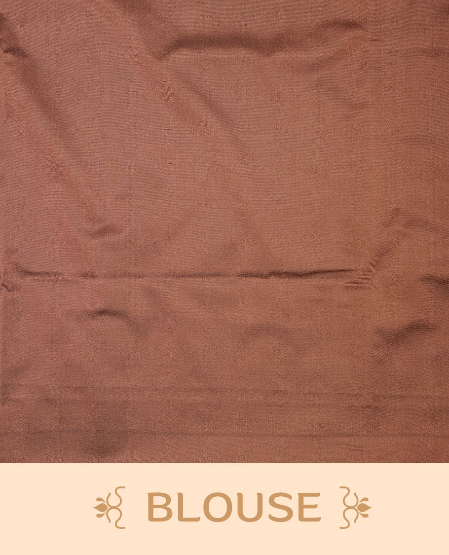 Maroon colour soft silk saree features a sleek borderless design with intricate antique zari motifs, flowing into a striking contrast biscuit orange pallu and a matching blouse piece.