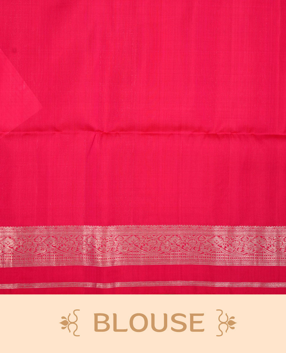Rani pink colour soft silk saree featuring gold zari motifs on body, complemented by self colour with traditional border with tassel at pallu, paired with matching blouse piece.