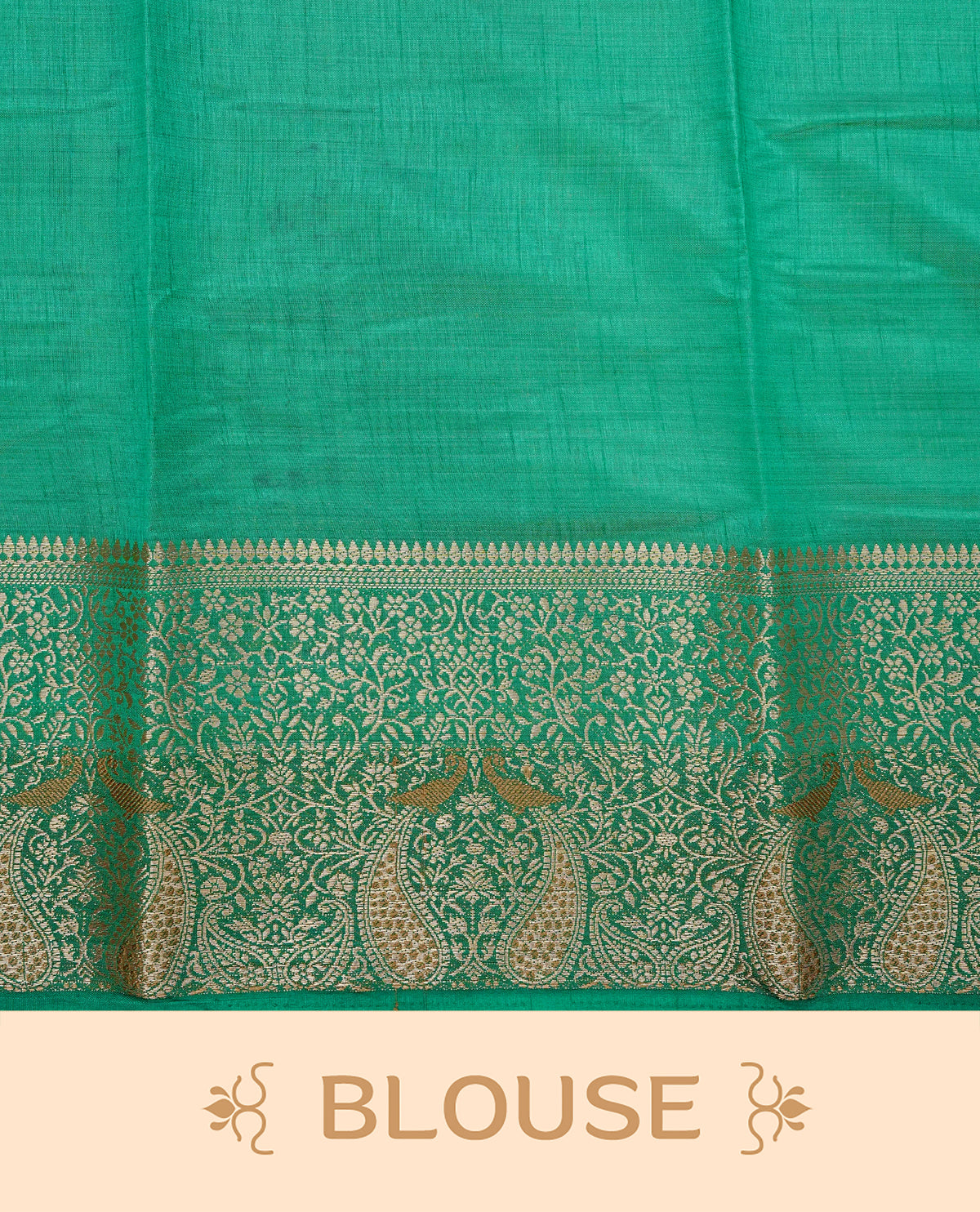 Light gold tussar saree featuring Elegant plain body, complemented by contrast Green colour with Gold zari Floral kodi with Peacock Pattern border, comes with matching blouse piece.