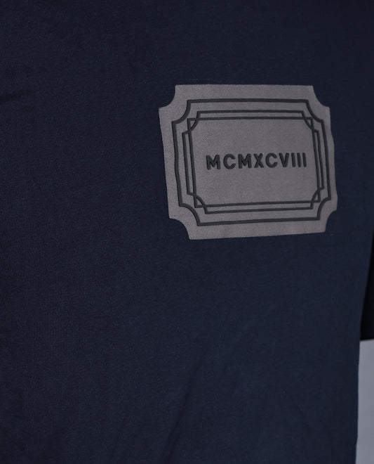 Dark Blue colour Tshirt featuring Round neck, Text on body and Half sleeve.