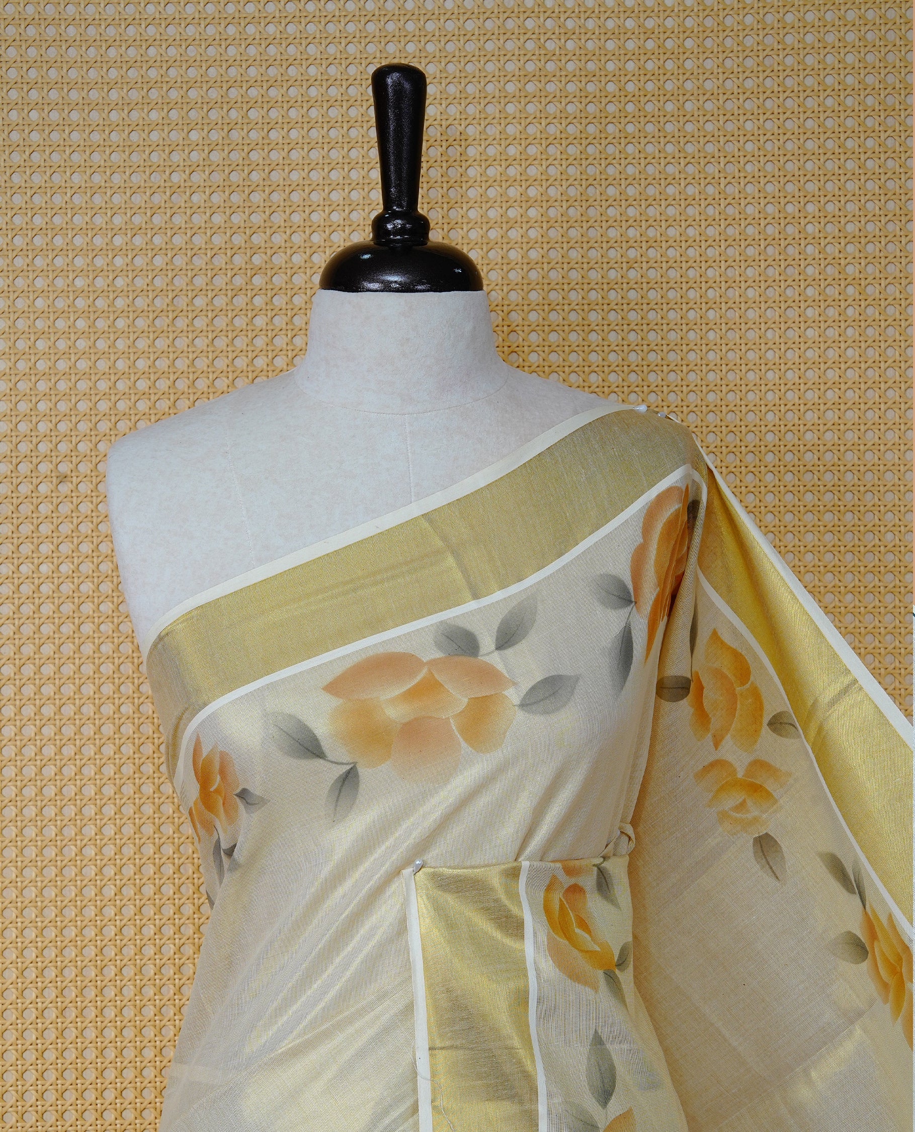 Cream Colour Tissue Kerala Saree Featuring Vibrant Floral Digital  Printed Border & Pallu , Beautifully Enhanced With A Classic Gold Zari Border And Contrast Tassels. Paired With A Matching Blouse Piece.