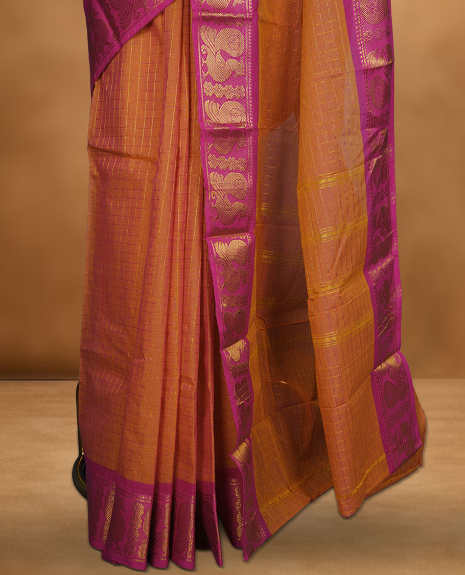 Orange colour chettinad cotton saree featuring gold zari check patterned body, contrast pink colour with traditional gold zari border paired without blouse.