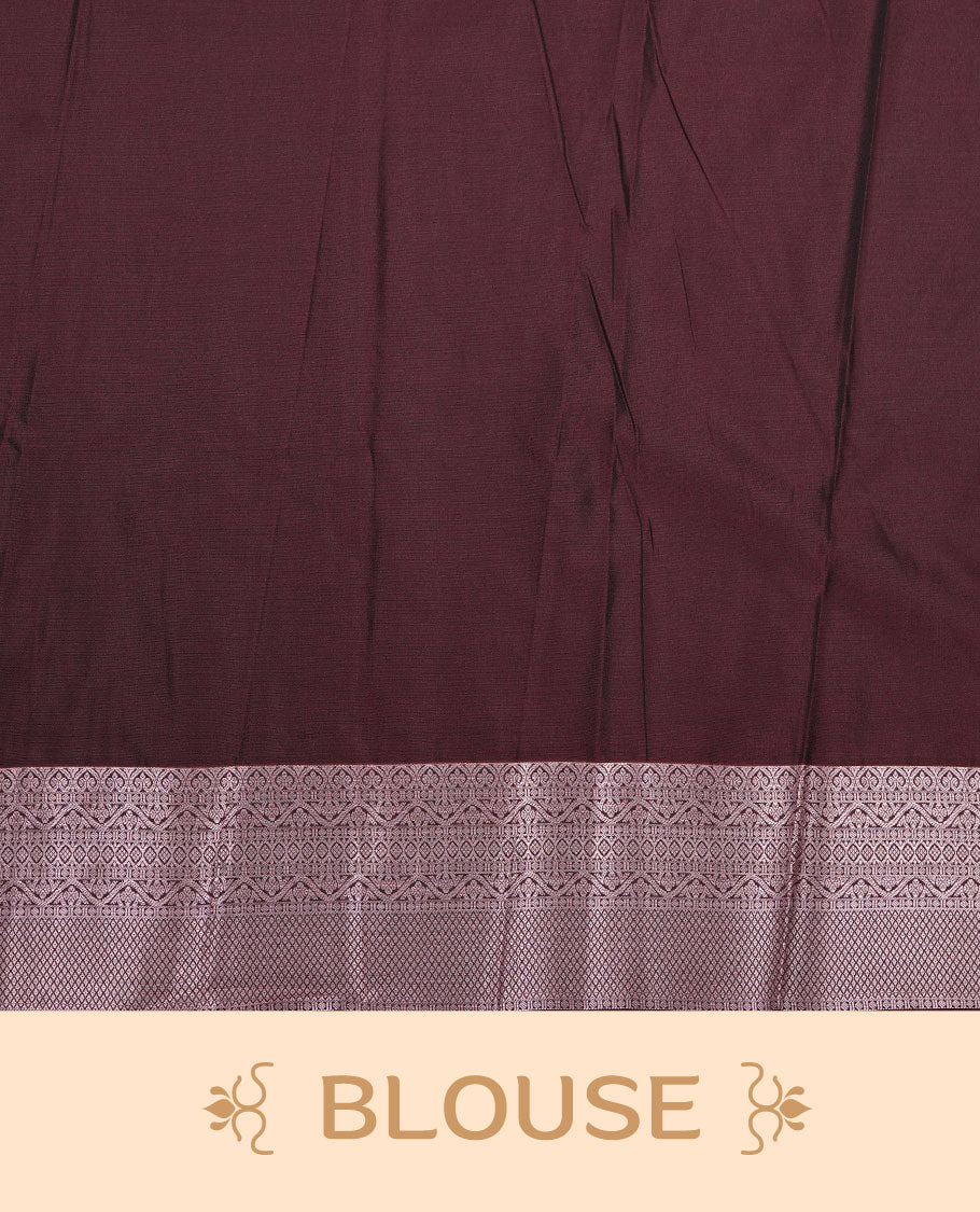 Chocolate brown colour soft silk saree featuring rose Gold zari motifs on body, complemented by self colour with traditional border, paired with matching blouse piece.