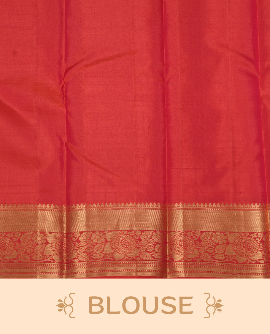 Peach orange colour kancheepuram silk saree featuring floral zari jacquard on body with traditional border, paired with matching blouse piece.