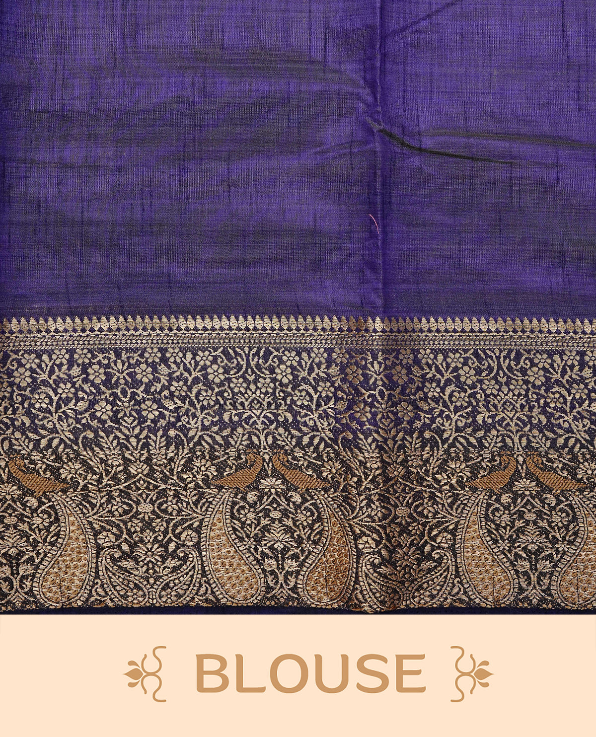 Light gold tussar saree featuring Elegant plain body, complemented by contrast Navy Blue colour with Gold zari Floral kodi with Peacock Pattern border, comes with matching blouse piece.